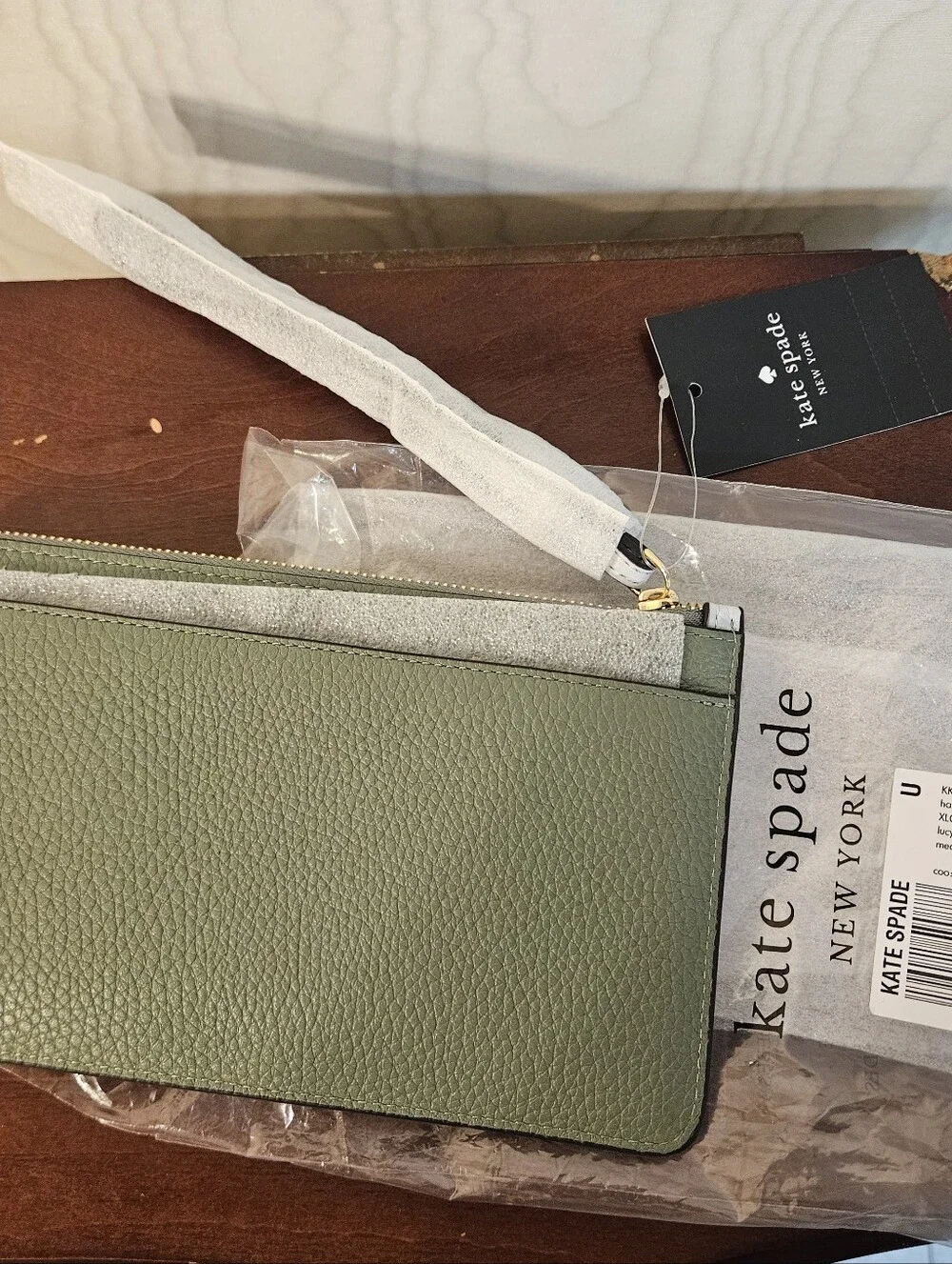 kate spade Pebbled Zip-Around Wallet in Light Blue with Gold Hardware